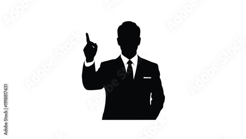 Silhouette of a sharply dressed businessman in a dark suit pointing one finger upward indicating an important idea or solution