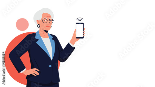 Sophisticated elderly businesswoman in a suit holding up a smartphone with a wireless connection signal icon.