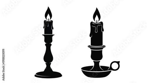 Two black candles with flames a striking silhouette