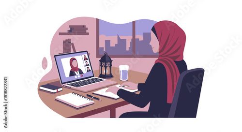 woman in hijab working remotely on laptop.