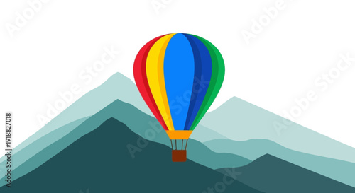 Colorful hot air balloon flying over mountains