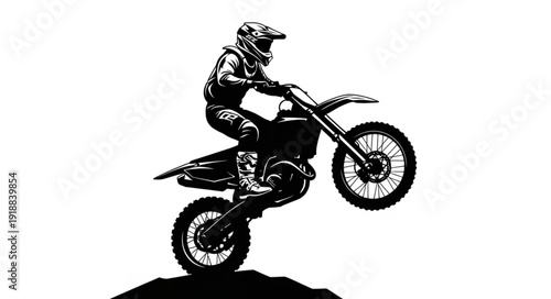 Motorcycle Rider Performing Wheelie Jump.