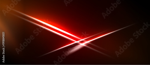Abstract red light streaks cross dark background. Bright glow emanates from central intersection. Dramatic visual effect.