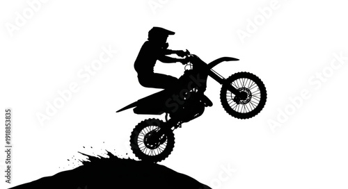 Motorcyclist Riding Dirt Bike in Air.