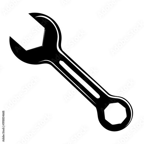 A black wrench with an open-end and ring spanner on a neutral background viewed from a slight angle