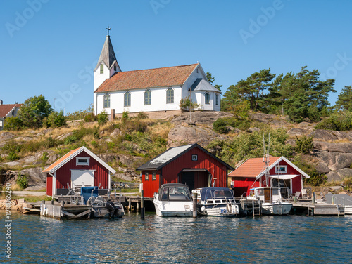 Hamburgsund chapel and boathouses on Hamburgö in Hamburgsund, Tanum, Bohuslän archipelago, west coast Sweden