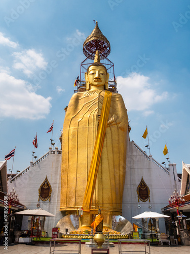 The Standing Buddha or Luang Pho To at Wat Indharaviharn, Bangkok, Kingdom of Thailand.