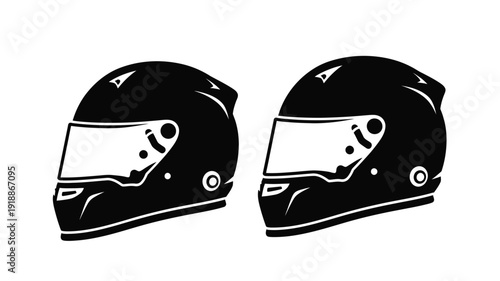 Two racing helmets displayed against a white background a striking silhouette