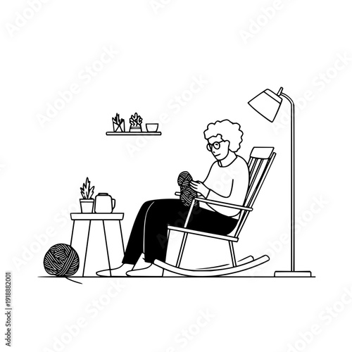 Senior Woman Knitting in Rocking Chair at Home