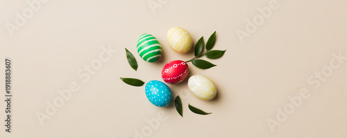 Wallpaper Mural Colorful Easter eggs with spring flower leaf isolated over white background. Colored Egg Holiday border Torontodigital.ca