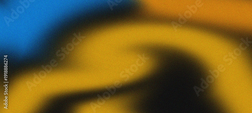 Foto A blurry image with blue and yellow colors