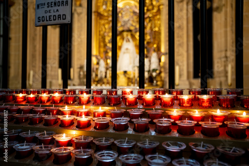Candles in a cathedral interior in Salamanca, Spain.. Interior of the Cathedral of Salamanca, Spain