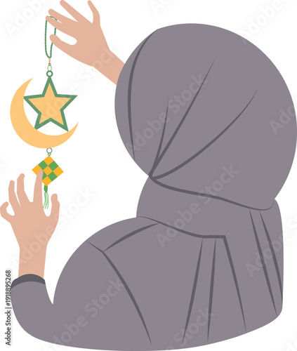 Back View of Muslim Woman in Hijab Hanging Ramadan Crescent and Star Decoration