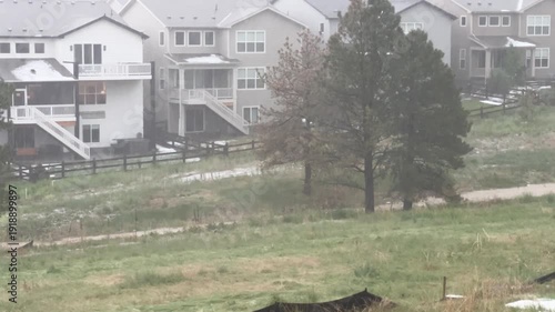 Hail Storm on Wooden Deck with Patio Furniture