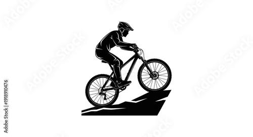 Mountain Biker Riding Downhill Silhouette.