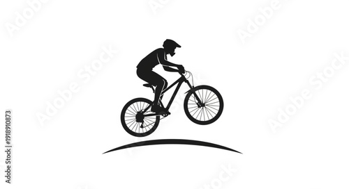 Mountain Biker Riding Downhill Silhouette.