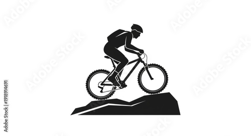 Mountain Biker Riding Downhill Silhouette.