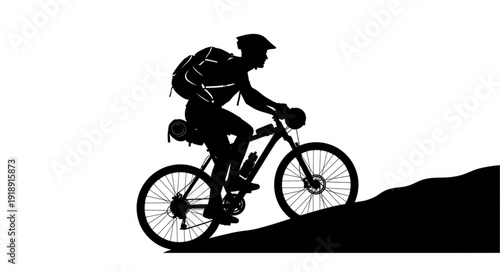 Mountain Biker Riding Downhill Trail.