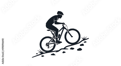Mountain Biker Riding Downhill Trail.