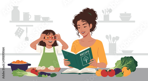 Mother and young daughter enjoy cooking together while reading a recipe book in a bright kitchen with fresh vegetables on the counter.