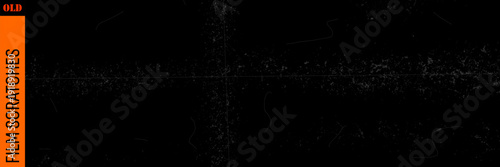 Old film texture with scratch specks on paper, cinematic grain and light streaks, classic film style with paper scratch detail.