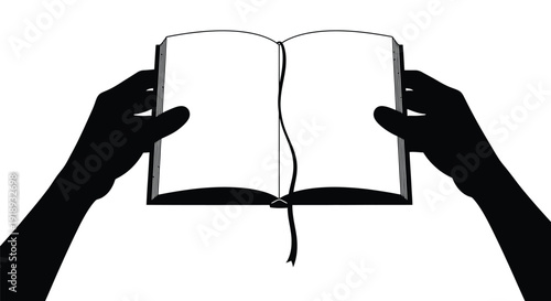 A silhouetted image of hands holding an open book with blank pages