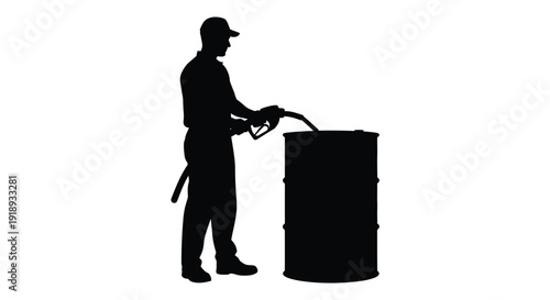 Silhouette of a man fueling a large black barrel with a pump