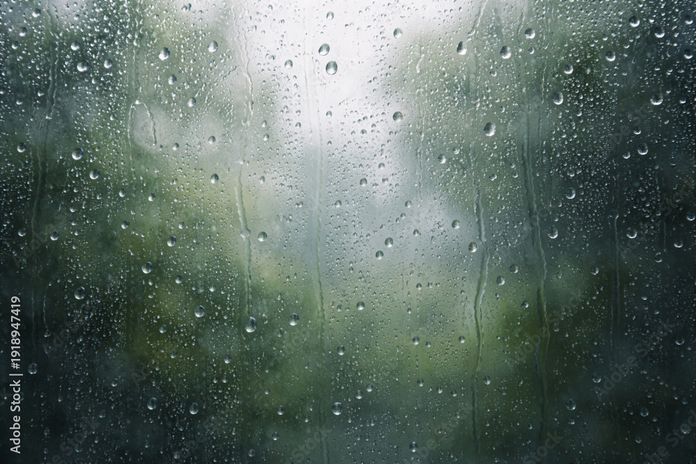 Obraz premium AI, Water droplets, condensation, rain, window glass background showing close view of moisture beads on fogged surface, soft focus texture with natural light creating calm peaceful mood, cozy weather 