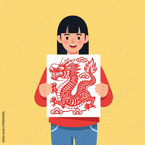 Happy girl shows beautiful traditional Chinese dragon paper cutting art