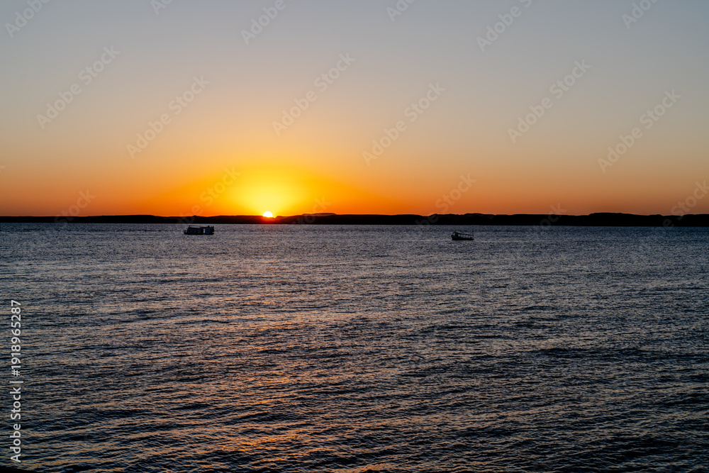 Obraz premium Golden Sunrise on Nile River in Aswan Egypt