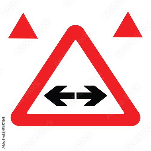Road sign warning of a width restriction or narrow passage, indicated by a red triangle with double-headed arrows.