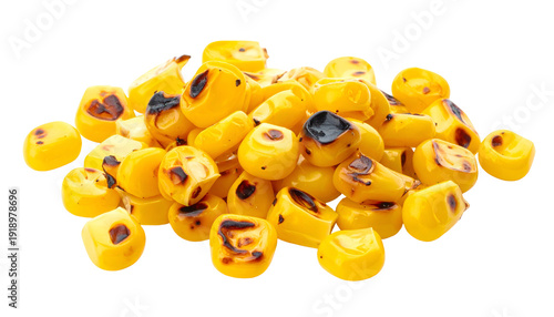 Close-up of roasted corn kernels in a pile. The kernels are bright yellow with charred patches, against a black background