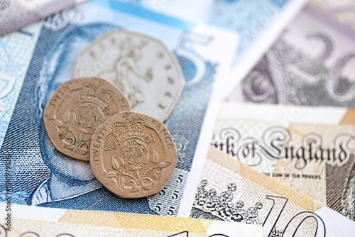 Coins and banknotes of United Kingdom and Great Britain pound currency. UK money close up. Business, economy and finance concept