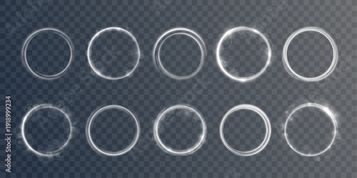 Round shimmering frame with radiant particles floats on transparent field. Golden shine adds magic mood.