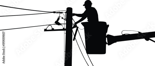 Silhouette of utility lineman working on electrical power lines from bucket truck, repairing overhead cables , professional electrician maintenance and energy infrastructure service.