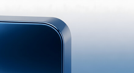 Close-up perspective of the rounded corner of a sleek, modern device with a smooth metallic blue finish, showcasing its premium build quality and minimalist design against a soft gradient background
