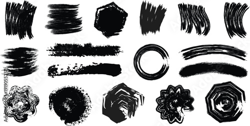 Collection of black brush strokes and smudges on white background
