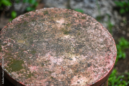 Weathered circular stone surface