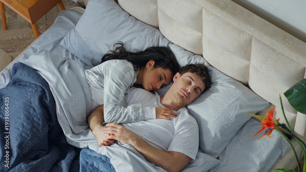 Αυτοκόλλητο Happy Caucasian couple man woman sleeping together on bed home bedroom daydream
