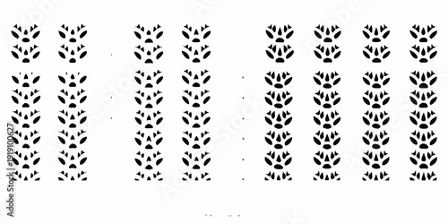 Repetitive pattern of dark leaf like shapes arranged in vertical columns
