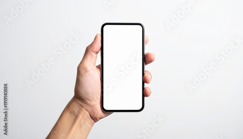 Hand Holding a Modern Smartphone with Blank White Screen for App UI Mockup Presentation and Product Display.