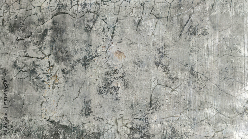 Fototapeta premium Cracked Concrete Texture with Subtle Yellow Tinge, Ideal for Backgrounds and Industrial Designs