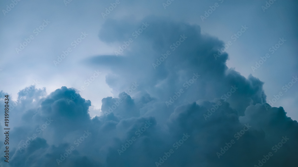 Αυτοκόλλητο Dramatic dark storm clouds gathering ominously in the sky, signaling an impendin