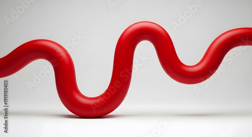A red wavy line sculpture stands out against a plain white background