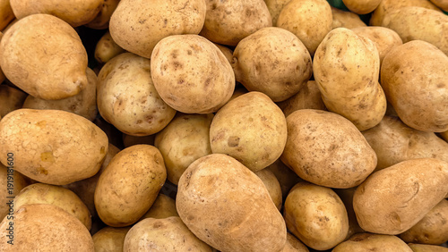 Wallpaper Mural Freshly Harvested Organic Potatoes Piled High in a Market Display Torontodigital.ca