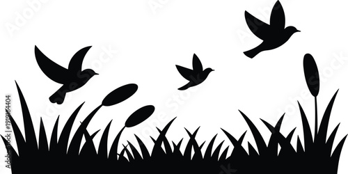 Four black birds flying over tall grass with reeds in a minimalist silhouette style