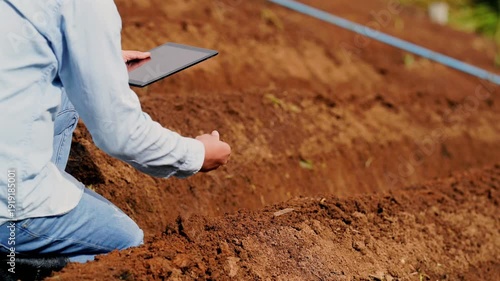 Digital farmer agriculture tablet soil field technology rural crop inspection modern precision farming smart agronomy research analysis monitoring outdoor data planting planning checking agriculture