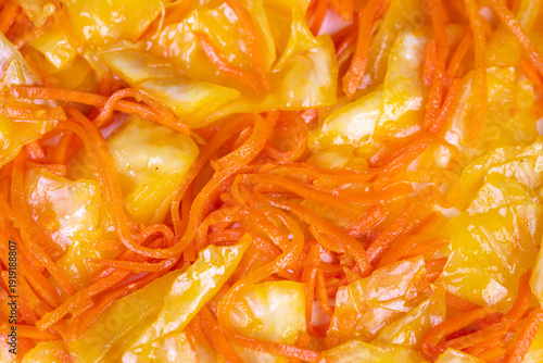 Vivid fermented vegetables. Detailed image of seasoned fermented vegetables with spicy oil. Magnified view of glistening pickled vegetables layered with fiery chili oil