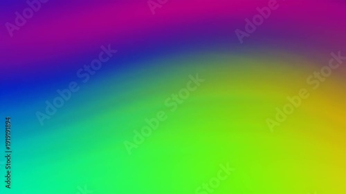 Abstract rainbow waves forming a bright and colorful blurred background with flowing lines and smooth gradients