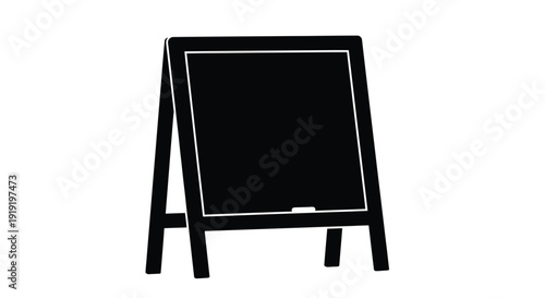 A simple black chalkboard on a wooden easel isolated on white